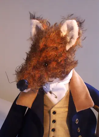 Fox in navy hunting coat